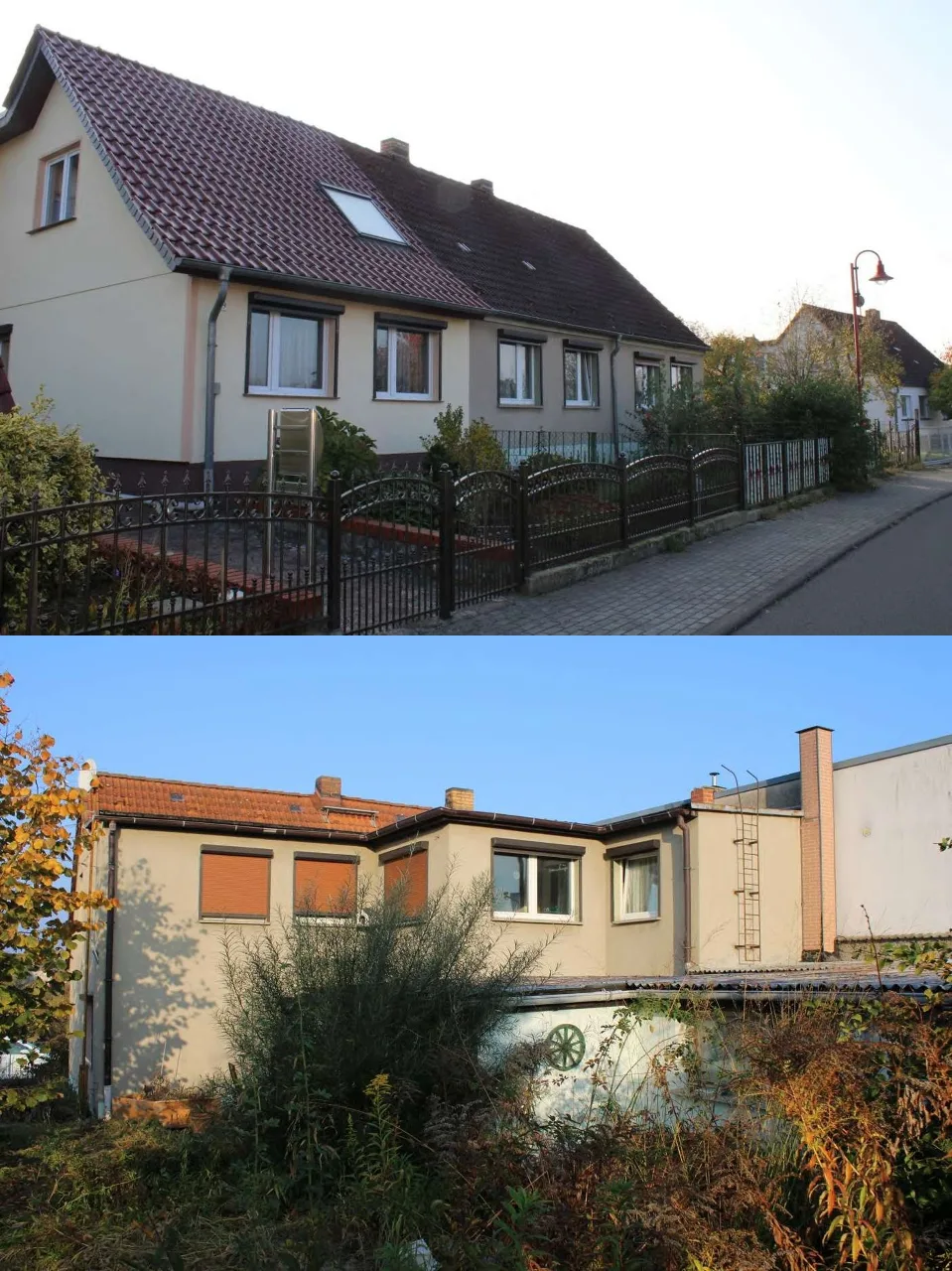 Frontansicht eines zweigeschossigen Einfamilienhauses mit Satteldach und Zaun